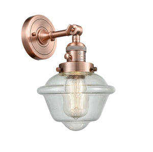 203SW-AC-G534 1-Light 7.5" Antique Copper Sconce - Seedy Small Oxford Glass - LED Bulb - Dimmensions: 7.5 x 9 x 12 - Glass Up or Down: Yes