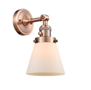 203SW-AC-G61 1-Light 6.25" Antique Copper Sconce - Matte White Cased Small Cone Glass - LED Bulb - Dimmensions: 6.25 x 8 x 10 - Glass Up or Down: Yes