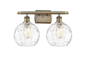 516-2W-AB-G1215-8 2-Light 18" Antique Brass Bath Vanity Light - Clear Athens Water Glass 8" Glass - LED Bulb - Dimmensions: 18 x 8 x 13 - Glass Up or Down: Yes