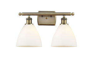 516-2W-AB-GBD-751 2-Light 18" Antique Brass Bath Vanity Light - Matte White Ballston Dome Glass - LED Bulb - Dimmensions: 18 x 8.125 x 11.25 - Glass Up or Down: Yes