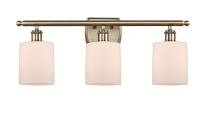 3-Light 26" Antique Brass Bath Vanity Light - Matte White Cobbleskill Glass LED
