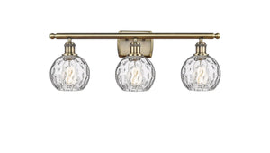 516-3W-AB-G1215-6 3-Light 26" Antique Brass Bath Vanity Light - Clear Athens Water Glass 6" Glass - LED Bulb - Dimmensions: 26 x 8 x 11 - Glass Up or Down: Yes
