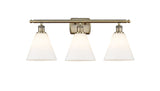 516-3W-AB-GBC-81 3-Light 28" Antique Brass Bath Vanity Light - Matte White Cased Ballston Cone Glass - LED Bulb - Dimmensions: 28 x 8.125 x 11.25 - Glass Up or Down: Yes