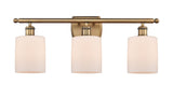 516-3W-BB-G111 3-Light 26" Brushed Brass Bath Vanity Light - Matte White Cobbleskill Glass - LED Bulb - Dimmensions: 26 x 6.5 x 9.5 - Glass Up or Down: Yes
