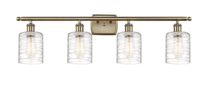 4-Light 36" Antique Brass Bath Vanity Light - Deco Swirl Cobbleskill - LED