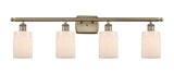 4-Light 36" Antique Brass Bath Vanity Light - Matte White Hadley Glass LED