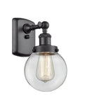916-1W-BK-G202-6 1-Light 6" Matte Black Sconce - Clear Beacon Glass - LED Bulb - Dimmensions: 6 x 7.5 x 11 - Glass Up or Down: Yes