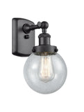 916-1W-BK-G204-6 1-Light 6" Matte Black Sconce - Seedy Beacon Glass - LED Bulb - Dimmensions: 6 x 7.5 x 11 - Glass Up or Down: Yes