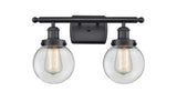 916-2W-BK-G202-6 2-Light 16" Matte Black Bath Vanity Light - Clear Beacon Glass - LED Bulb - Dimmensions: 16 x 7.5 x 11 - Glass Up or Down: Yes