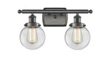 916-2W-OB-G202-6 2-Light 16" Oil Rubbed Bronze Bath Vanity Light - Clear Beacon Glass - LED Bulb - Dimmensions: 16 x 7.5 x 11 - Glass Up or Down: Yes