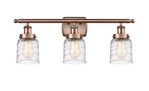 3-Light 26" Antique Copper Bath Vanity Light - Clear Deco Swirl Small Bell Glass LED
