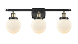 916-3W-BAB-G201-6 3-Light 26" Black Antique Brass Bath Vanity Light - Matte White Cased Beacon Glass - LED Bulb - Dimmensions: 26 x 7.5 x 11 - Glass Up or Down: Yes