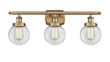 916-3W-BB-G202-6 3-Light 26" Brushed Brass Bath Vanity Light - Clear Beacon Glass - LED Bulb - Dimmensions: 26 x 7.5 x 11 - Glass Up or Down: Yes