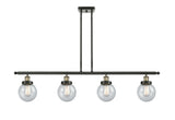 916-4I-BAB-G204-6 4-Light 48" Black Antique Brass Island Light - Seedy Beacon Glass - LED Bulb - Dimmensions: 48 x 6 x 10<br>Minimum Height : 19.375<br>Maximum Height : 43.375 - Sloped Ceiling Compatible: Yes