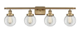 916-4W-BB-G202-6 4-Light 36" Brushed Brass Bath Vanity Light - Clear Beacon Glass - LED Bulb - Dimmensions: 36 x 8 x 11 - Glass Up or Down: Yes