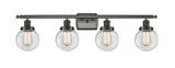 916-4W-OB-G202-6 4-Light 36" Oil Rubbed Bronze Bath Vanity Light - Clear Beacon Glass - LED Bulb - Dimmensions: 36 x 8 x 11 - Glass Up or Down: Yes