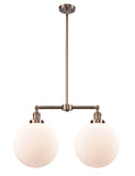 209-AC-G201-12 2-Light 27" Antique Copper Island Light - Matte White Cased Beacon Glass - LED Bulb - Dimmensions: 27 x 12 x 16<br>Minimum Height : 26.875<br>Maximum Height : 50.875 - Sloped Ceiling Compatible: Yes
