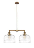 209-BB-G713-L 2-Light 21" Brushed Brass Island Light - Clear Deco Swirl X-Large Bell Glass - LED Bulb - Dimmensions: 21 x 5 x 10<br>Minimum Height : 23.125<br>Maximum Height : 47.125 - Sloped Ceiling Compatible: Yes