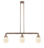 213-AC-G201-6 3-Light 38.5" Antique Copper Island Light - Matte White Cased Beacon Glass - LED Bulb - Dimmensions: 38.5 x 6 x 10.875<br>Minimum Height : 20<br>Maximum Height : 44 - Sloped Ceiling Compatible: Yes