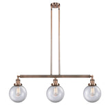 213-AC-G202-8 3-Light 40.5" Antique Copper Island Light - Clear Beacon Glass - LED Bulb - Dimmensions: 40.5 x 8 x 12.875<br>Minimum Height : 22<br>Maximum Height : 46 - Sloped Ceiling Compatible: Yes