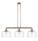 213-AC-G713-L 3-Light 42" Antique Copper Island Light - Clear Deco Swirl X-Large Bell Glass - LED Bulb - Dimmensions: 42 x 12 x 13<br>Minimum Height : 22.25<br>Maximum Height : 46.25 - Sloped Ceiling Compatible: Yes