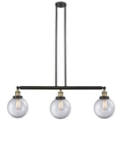 213-BAB-G202-8 3-Light 40.5" Black Antique Brass Island Light - Clear Beacon Glass - LED Bulb - Dimmensions: 40.5 x 8 x 12.875<br>Minimum Height : 22<br>Maximum Height : 46 - Sloped Ceiling Compatible: Yes