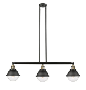 213-BAB-HFS-62-BK 3-Light 39.75" Matte Black Island Light - Clear Hampden Glass - LED Bulb - Dimmensions: 39.75 x 7.25 x 10.5<br>Minimum Height : 19.5<br>Maximum Height : 43.5 - Sloped Ceiling Compatible: Yes