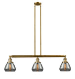 213-BB-G173 3-Light 39.25" Brushed Brass Island Light - Plated Smoke Fulton Glass - LED Bulb - Dimmensions: 39.25 x 6.75 x 10<br>Minimum Height : 19.5<br>Maximum Height : 43.5 - Sloped Ceiling Compatible: Yes