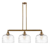 213-BB-G713-L 3-Light 42" Brushed Brass Island Light - Clear Deco Swirl X-Large Bell Glass - LED Bulb - Dimmensions: 42 x 12 x 13<br>Minimum Height : 22.25<br>Maximum Height : 46.25 - Sloped Ceiling Compatible: Yes