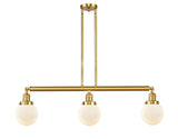 213-SG-G201-6 3-Light 38.5" Satin Gold Island Light - Matte White Cased Beacon Glass - LED Bulb - Dimmensions: 38.5 x 6 x 10.875<br>Minimum Height : 20<br>Maximum Height : 44 - Sloped Ceiling Compatible: Yes