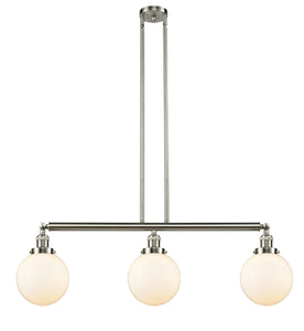 213-AB-G201-8 3-Light 40.5" Antique Brass Island Light - Matte White Cased Beacon Glass - LED Bulb - Dimmensions: 40.5 x 8 x 12.875<br>Minimum Height : 22<br>Maximum Height : 46 - Sloped Ceiling Compatible: Yes