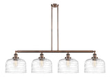214-AC-G713-L 4-Light 54" Antique Copper Island Light - Clear Deco Swirl X-Large Bell Glass - LED Bulb - Dimmensions: 54 x 12 x 13<br>Minimum Height : 22.25<br>Maximum Height : 46.25 - Sloped Ceiling Compatible: Yes