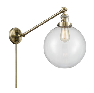 1-Light 10" Antique Brass Swing Arm - Clear Beacon Glass LED - w/Switch