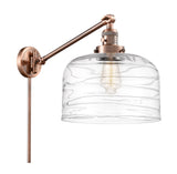 237-AC-G713-L 1-Light 12" Antique Copper Swing Arm - Clear Deco Swirl X-Large Bell Glass - LED Bulb - Dimmensions: 12 x 12 x 13 - Glass Up or Down: Yes