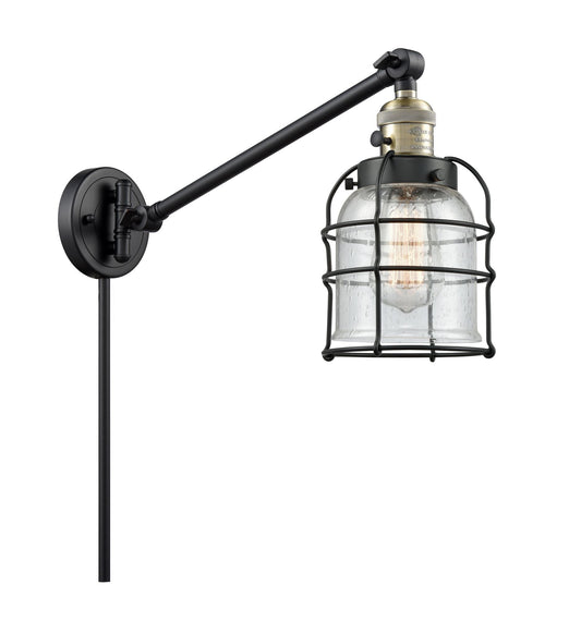1-Light 8" Black Antique Brass Swing Arm - Seedy Small Bell Cage Glass LED - w/Switch