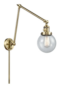 1-Light 6" Antique Brass Swing Arm - Seedy Beacon Glass LED - w/Switch