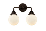 288-2W-OB-G201-6 2-Light 14" Oil Rubbed Bronze Bath Vanity Light - Matte White Cased Beacon Glass - LED Bulb - Dimmensions: 14 x 7.25 x 12.125 - Glass Up or Down: Yes