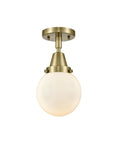 1-Light 6" Antique Brass Flush Mount - Matte White Cased Beacon Glass LED