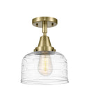 1-Light 8" Antique Brass Flush Mount - Clear Deco Swirl Large Bell Glass LED