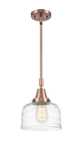 447-1S-AC-G713 Stem Hung 8" Antique Copper Mini Pendant - Clear Deco Swirl Large Bell Glass - LED Bulb - Dimmensions: 8 x 8 x 11.125<br>Minimum Height : 14.125<br>Maximum Height : 44.125 - Sloped Ceiling Compatible: Yes