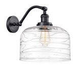 515-1W-BK-G713-L 1-Light 12" Matte Black Sconce - Clear Deco Swirl X-Large Bell Glass - LED Bulb - Dimmensions: 12 x 12 x 13 - Glass Up or Down: Yes
