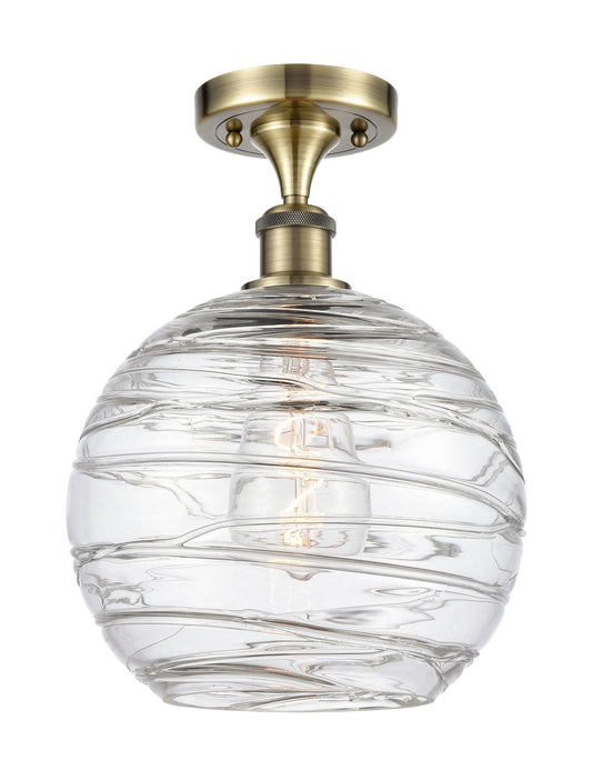 1-Light 10" Antique Brass Semi-Flush Mount - Clear Athens Deco Swirl 8" Glass LED