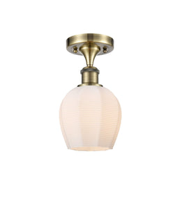 1-Light 5.75" Antique Brass Semi-Flush Mount - Cased Matte White Norfolk Glass LED