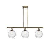 516-3I-AB-G1214-8 3-Light 36" Antique Brass Island Light - Clear Athens Twisted Swirl 8" Glass - LED Bulb - Dimmensions: 36 x 8 x 11<br>Minimum Height : 20.375<br>Maximum Height : 44.375 - Sloped Ceiling Compatible: Yes