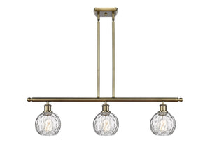 516-3I-AB-G1215-6 3-Light 36" Antique Brass Island Light - Clear Athens Water Glass 6" Glass - LED Bulb - Dimmensions: 36 x 7 x 9<br>Minimum Height : 20.375<br>Maximum Height : 44.375 - Sloped Ceiling Compatible: Yes