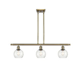 516-3I-AB-G124-6 3-Light 36" Antique Brass Island Light - Seedy Athens Glass - LED Bulb - Dimmensions: 36 x 6 x 9.375<br>Minimum Height : 18.375<br>Maximum Height : 42.375 - Sloped Ceiling Compatible: Yes