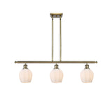 516-3I-AB-G461-6 3-Light 36" Antique Brass Island Light - Cased Matte White Norfolk Glass - LED Bulb - Dimmensions: 36 x 5.75 x 10<br>Minimum Height : 20.375<br>Maximum Height : 44.375 - Sloped Ceiling Compatible: Yes