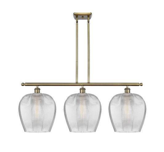 516-3I-AB-G462-12 3-Light 38.25" Antique Brass Island Light - Clear Norfolk Glass - LED Bulb - Dimmensions: 38.25 x 11.75 x 15.625<br>Minimum Height : 24.625<br>Maximum Height : 48.625 - Sloped Ceiling Compatible: Yes