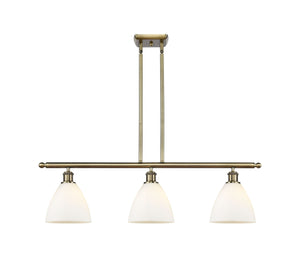 516-3I-AB-GBD-751 3-Light 36" Antique Brass Island Light - Matte White Ballston Dome Glass - LED Bulb - Dimmensions: 36 x 7.5 x 10.75<br>Minimum Height : 19.75<br>Maximum Height : 43.75 - Sloped Ceiling Compatible: Yes