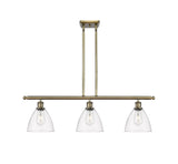 516-3I-AB-GBD-752 3-Light 36" Antique Brass Island Light - Clear Ballston Dome Glass - LED Bulb - Dimmensions: 36 x 7.5 x 10.75<br>Minimum Height : 19.75<br>Maximum Height : 43.75 - Sloped Ceiling Compatible: Yes